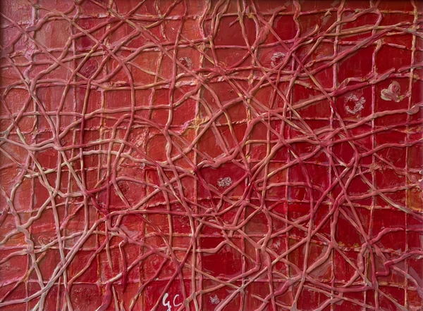 Connessioni 1 (2025), Giancarlo Carnevale. A fine raised network of pale lines across red